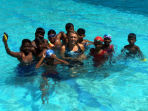 Teach children swimming in India