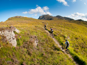 Coast-to-coast mtb tour Scotland: climbing towards Poolewe