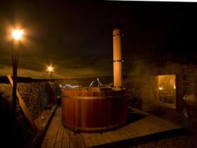 Swedish style hot tub and cave