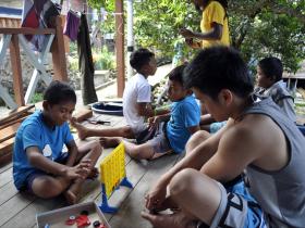 Interact with the local children