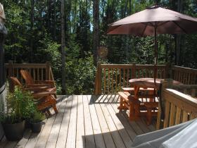 Spacious deck for taking in the forest symphony.