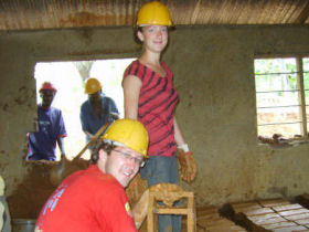 Volunteers building a classroom