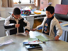 Volunteer with blind children in China