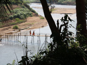 Volunteer with children in Laos