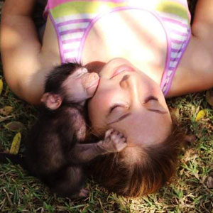 Family volunteering with monkeys in South Africa