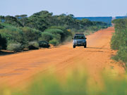 4WD on outback road, Western Australia. Photo from Tourism Western Australia