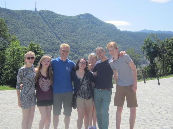 Family volunteering with bears in Romania