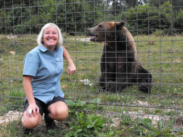 Family volunteering with bears in Romania