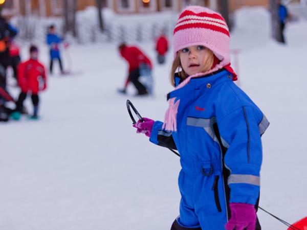 Family winter activity vacation in Finland