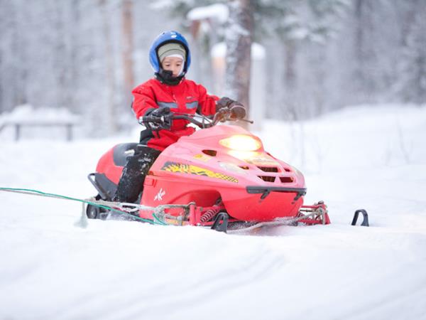 Family winter activity vacation in Finland