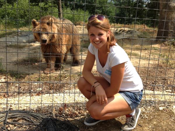 Family volunteering with bears in Romania