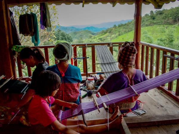 Thailand family volunteering with elephants