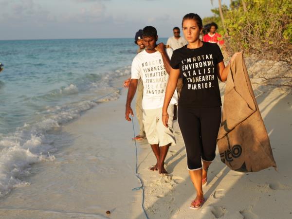 Family volunteering with turtles in the Maldives