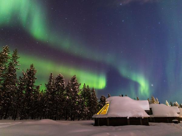 Downhill Skiing and Aurora hunting in Finnish Lapland