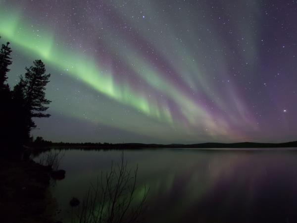 Wilderness auroras vacation during the Finnish Autumn