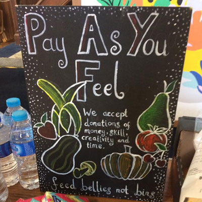 Pay as you feel sign