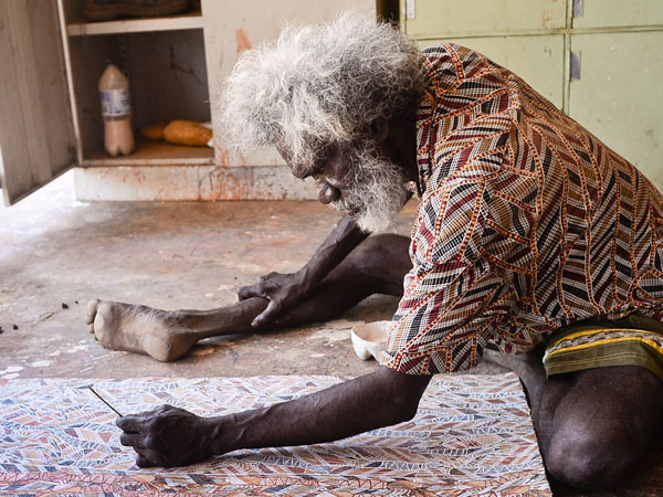 Aboriginal artist in Arnhemland