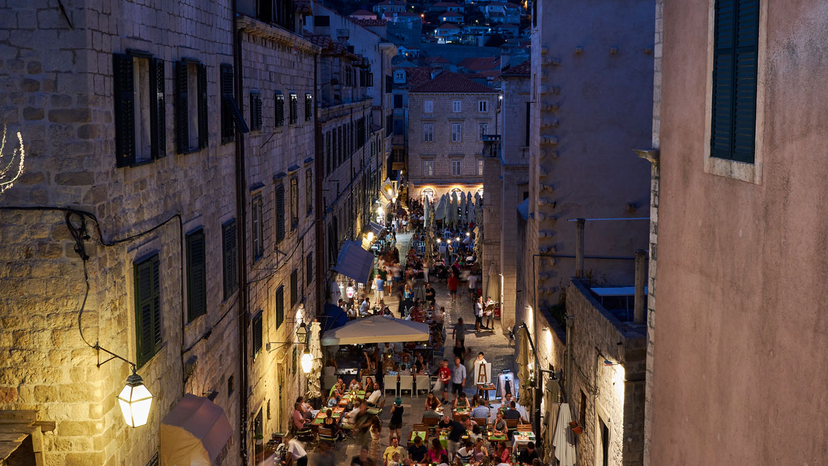 Busy street in Croatia with restaurants