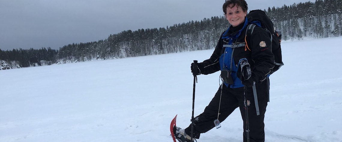 Grinning madly on a frozen lake
