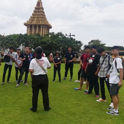 Tour group with temple in background