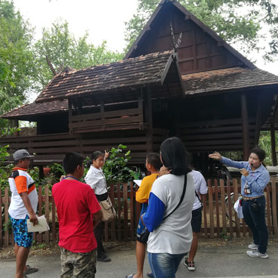 Tour guide talking to youths