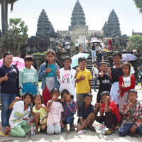 Happy group in front of temple complex