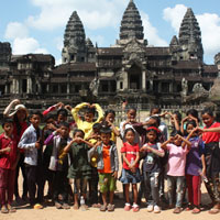 Happy children in front of temple complex