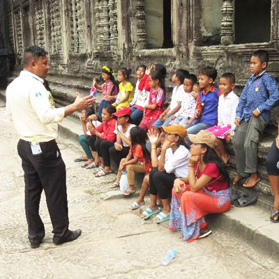 Guide explaining the ruins