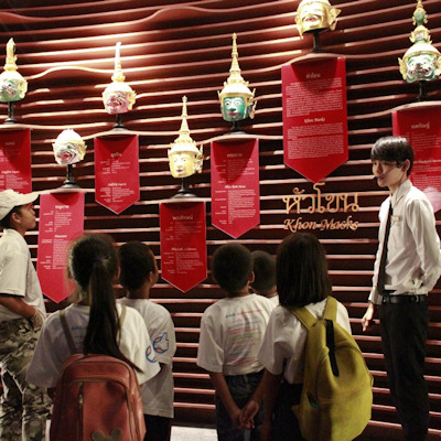 Children looking at masks