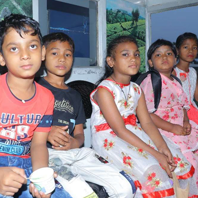 Kids pose together, Eco Park, India