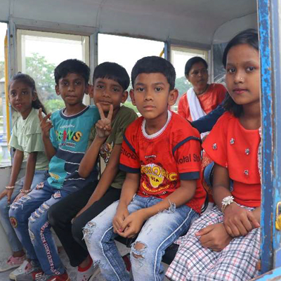 Kids pose together, Eco Park, India