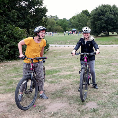 Mother and daughter on bikes