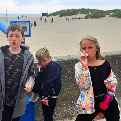 Children by the beach