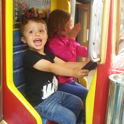 Toddler on amusement ride