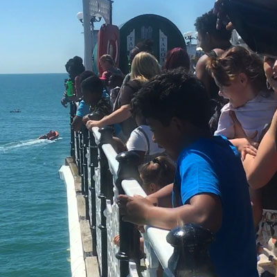 Families looking out at the sea