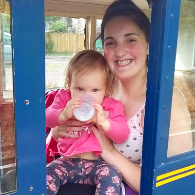 Girl with baby on the train