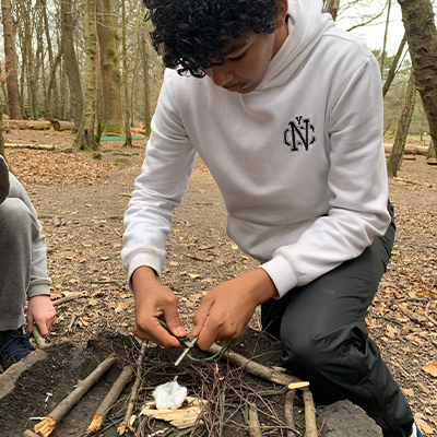 The children learning bushcraft skills