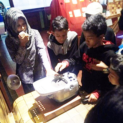 Children looking at artifacts