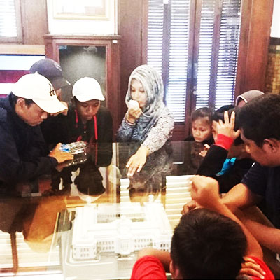 Group looking at a model building