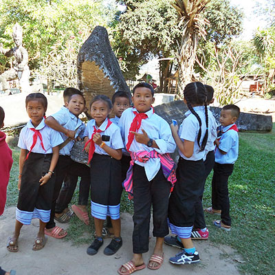 Children with crocodile statue