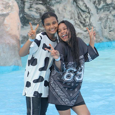 Two of the children pose for a photo at Nicco Amusement Park, India