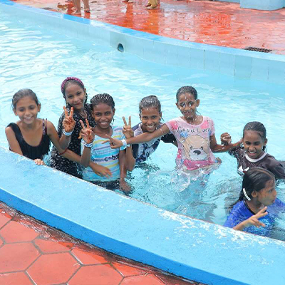 Some of the children pose for a photo at Nicco amusement park, India