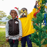 Children with a Christmas tree