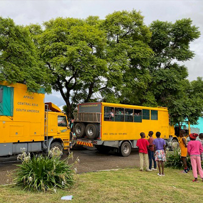 The kids by one of the overland trucks