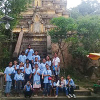 Children and youths in front of temple