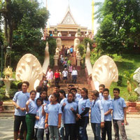 Youths outside an historical site