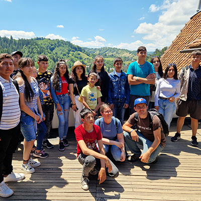 The whole group of kids posing for a photo together