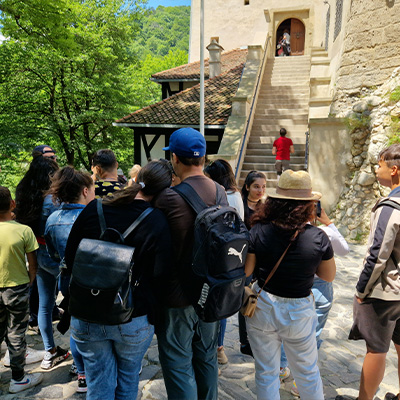 The children explore Bran Castle together