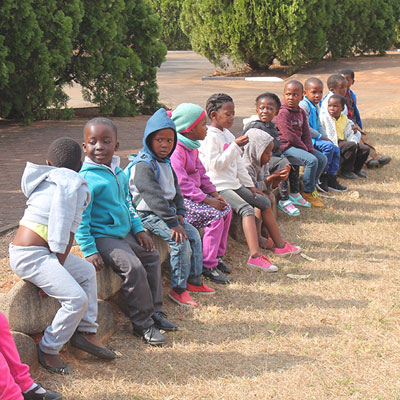 Children sitting in a row