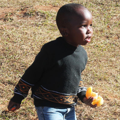 Child with orange